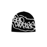 MERINO WOOL CIRCLE TAG BEANIE